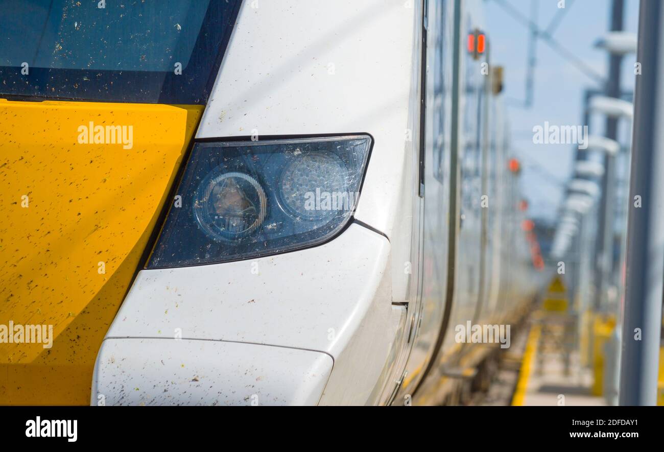 Lights on the front of a class 700 Desiro City train in Thameslink livery in a railway depot in the UK. Stock Photo