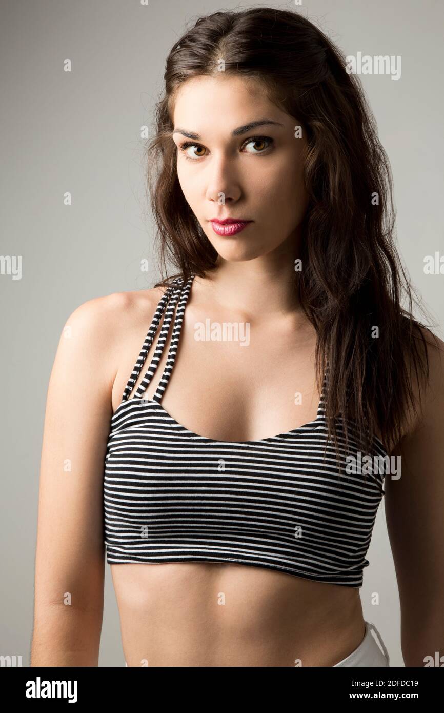 Portrait of Young Woman, Studio Shot Stock Photo