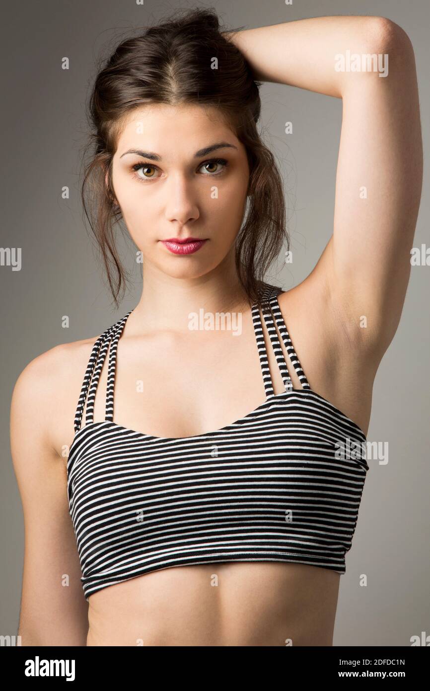 Portrait of Young Woman, Studio Shot Stock Photo
