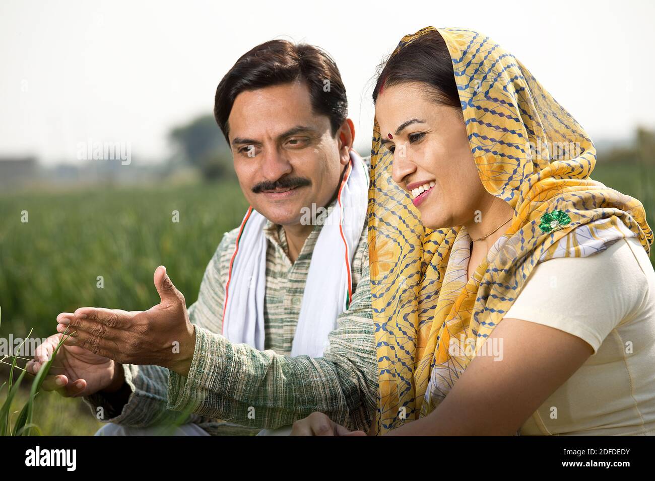 Rural Indian couple in agricultural field Stock Photo - Alamy