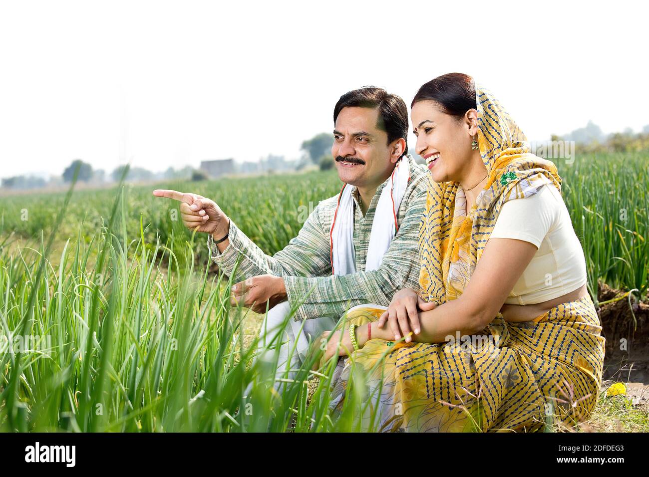 Rural Indian couple in agricultural field Stock Photo - Alamy