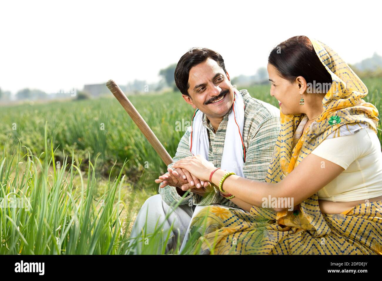 Rural Indian couple in agricultural field Stock Photo - Alamy