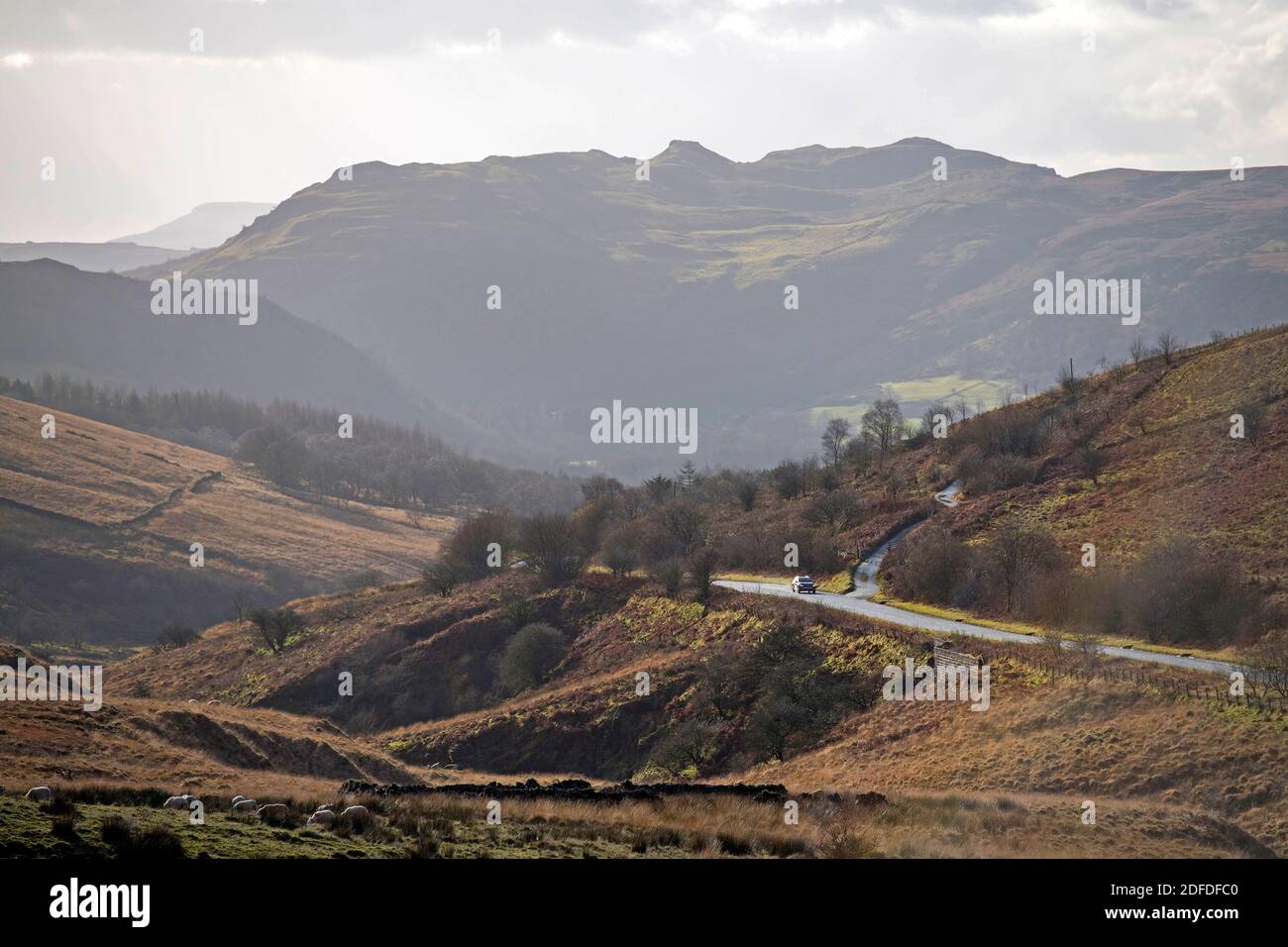 Abercrave, UK. 04th Dec, 2020. A car makes its way up the mountain road from Abercrave to Cray in the Brecon Beacons this afternoon during a break in the weather. Credit: Phil Rees/Alamy Live News Stock Photo
