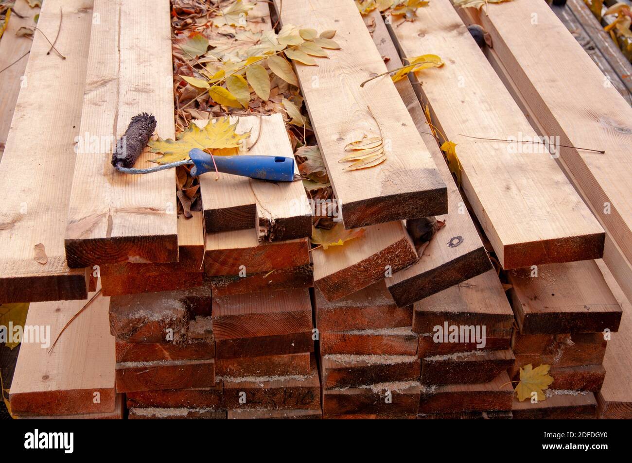Stacked lumber. Folded wood. Closeup wooden boards Stock Photo Alamy