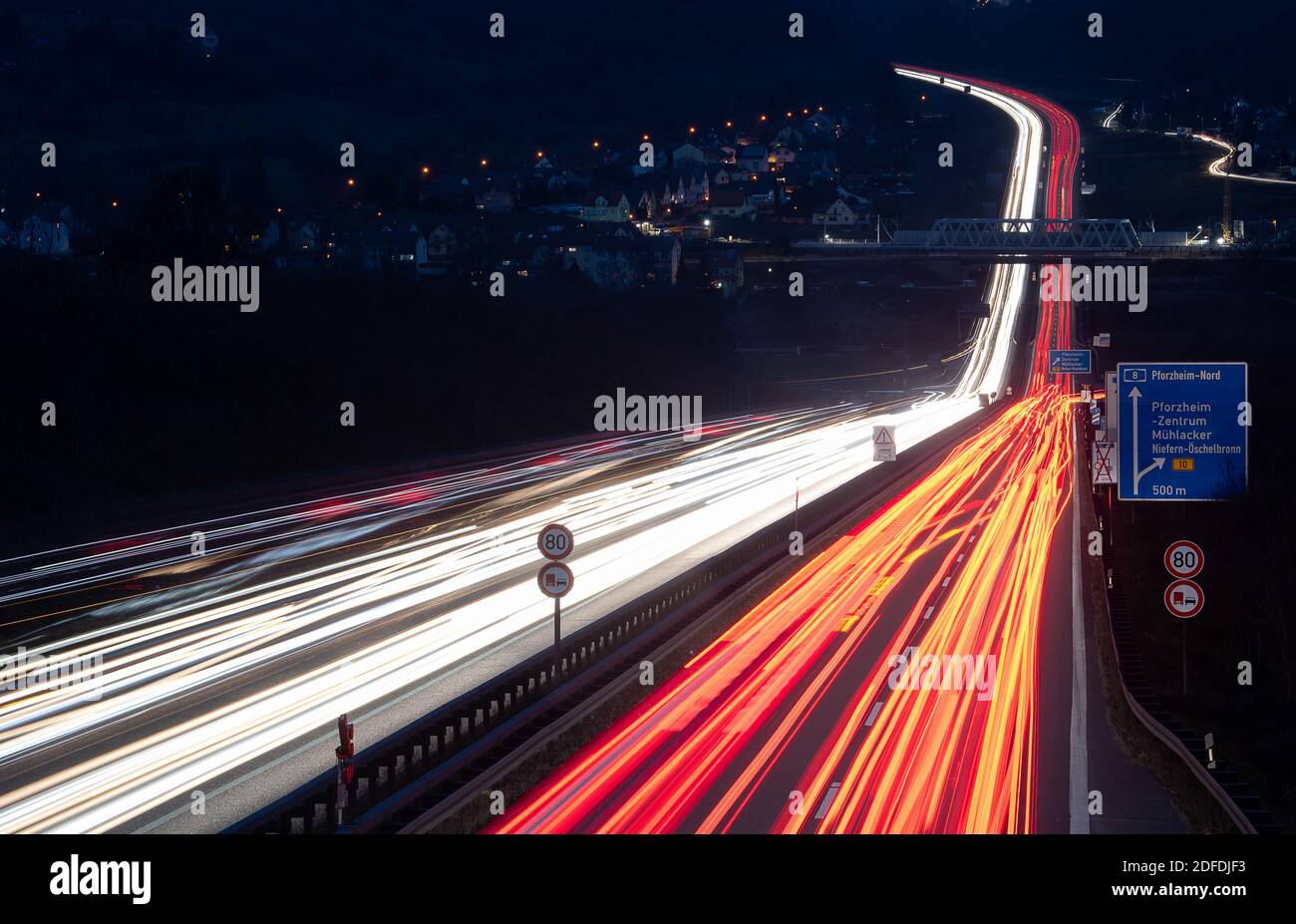Pforzheim, Germany. 04th Dec, 2020. Cars drive on the motorway 8 (A8).  (wiping effect due to long time exposure). On January 1, 2021,  responsibility for the motorways changes from the state to