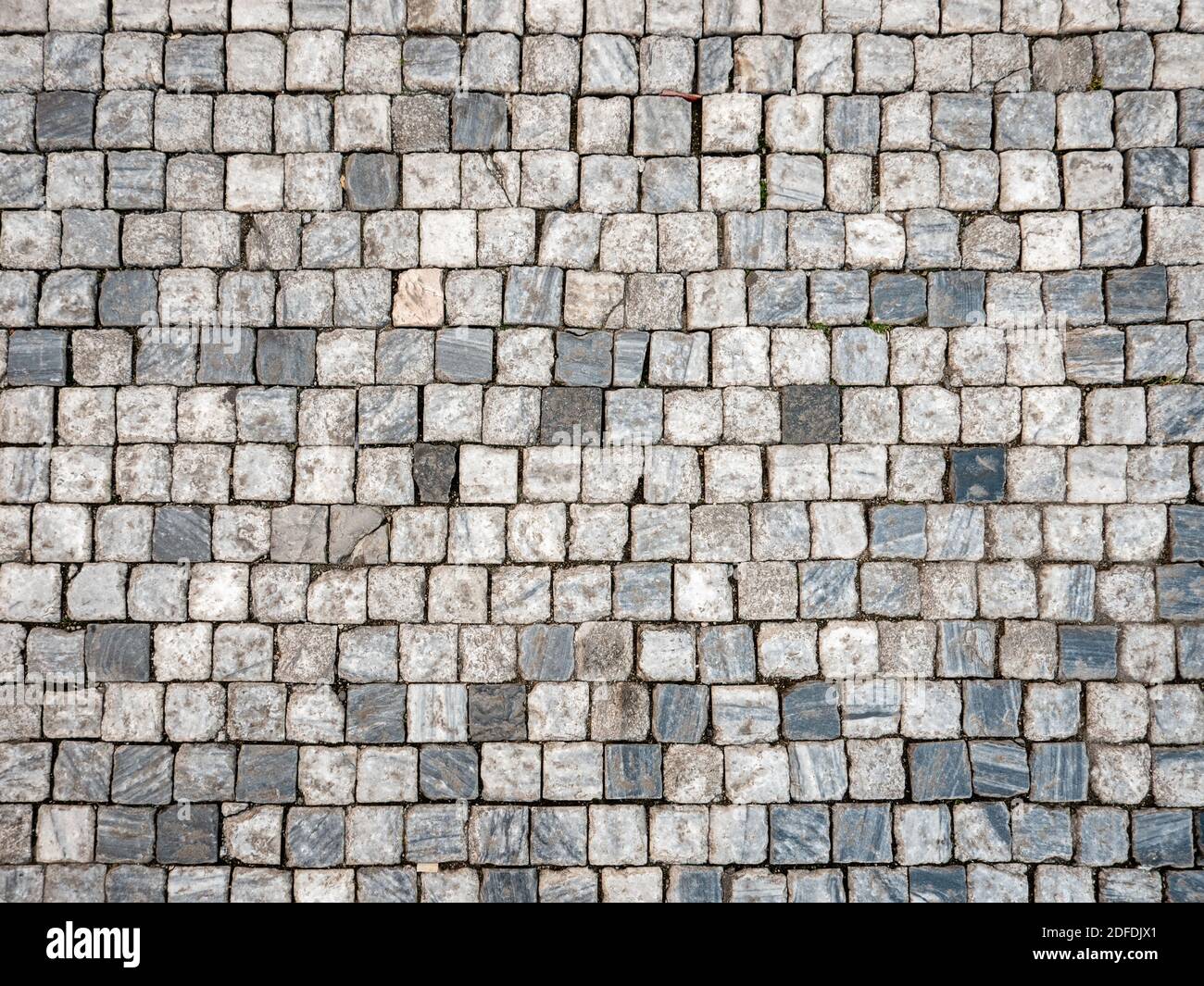 Cobbles. Abstract background texture of marble cobble stones in the Old Town district of Prague, Czech Republic. Stock Photo