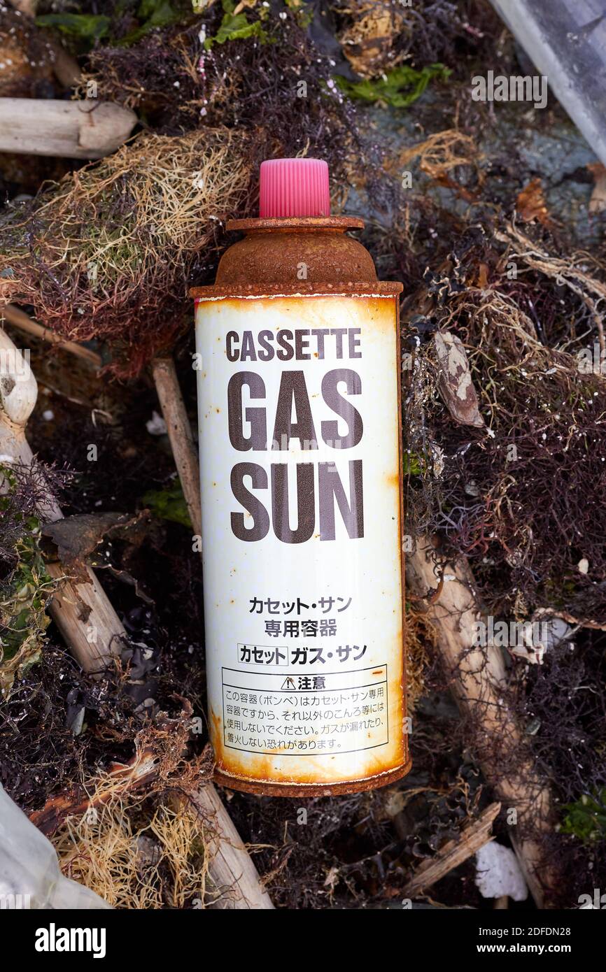 Cassette Gas Sun can, rusty gas canister, Japanese, washed up on the