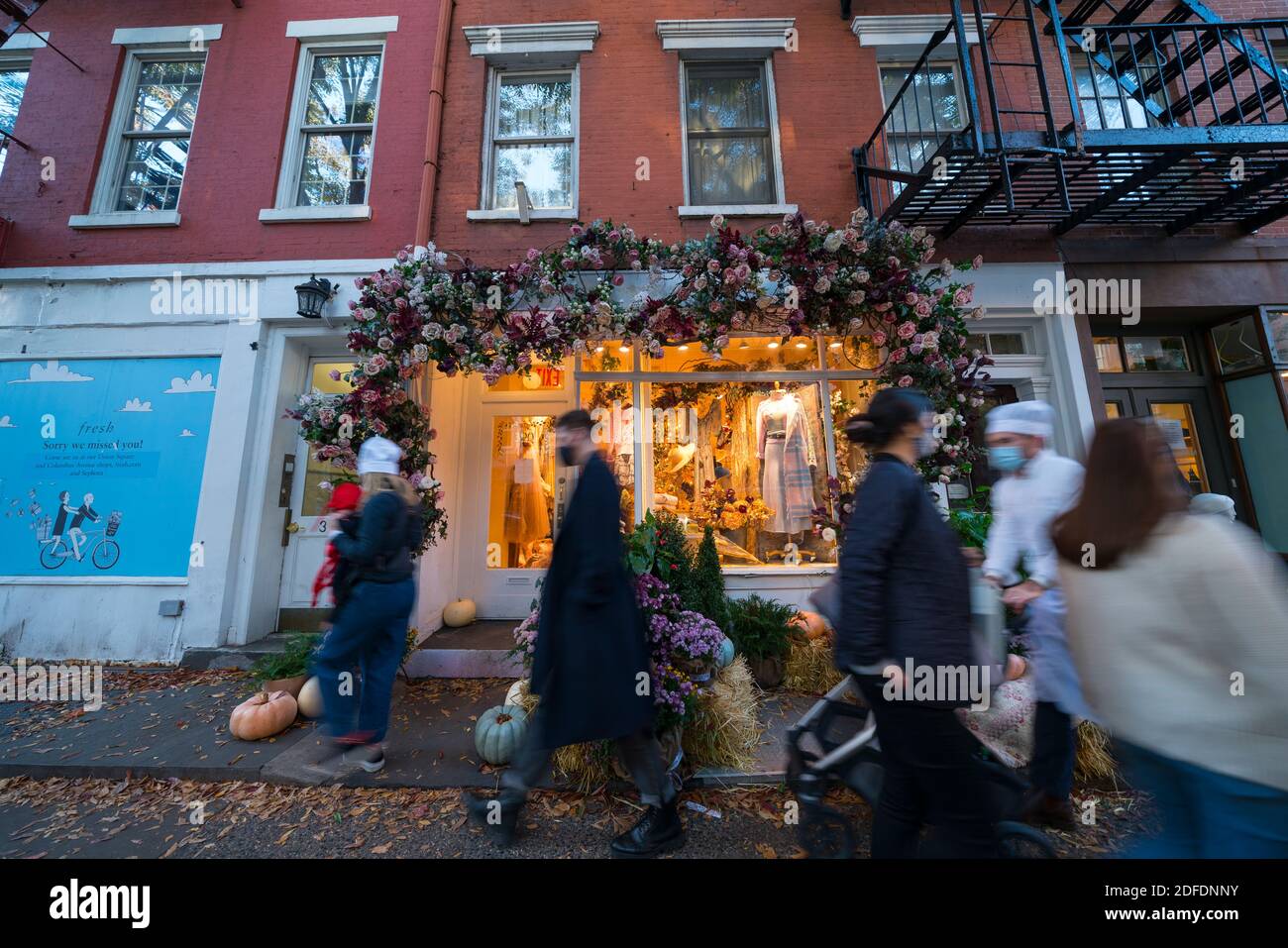 Beautiful Halloween decorations at storefront in West Village NYC Stock