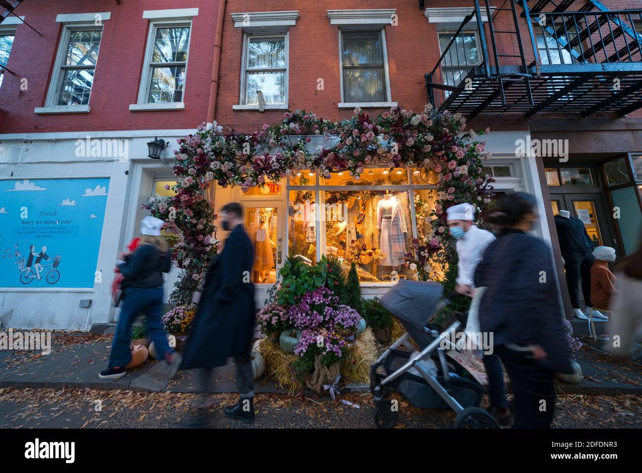 Beautiful Halloween decorations at storefront in West Village NYC Stock