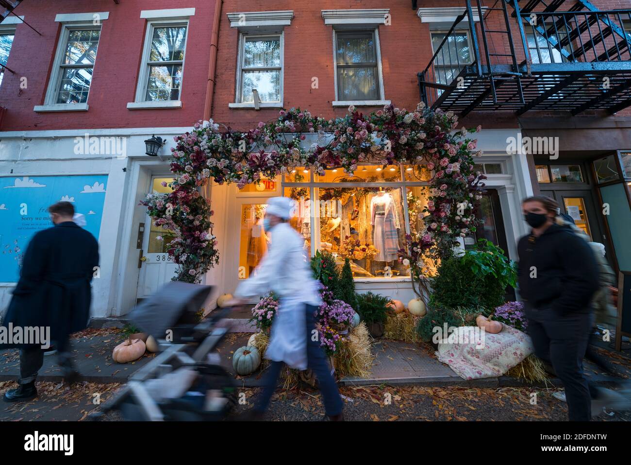 Beautiful Halloween decorations at storefront in West Village NYC Stock