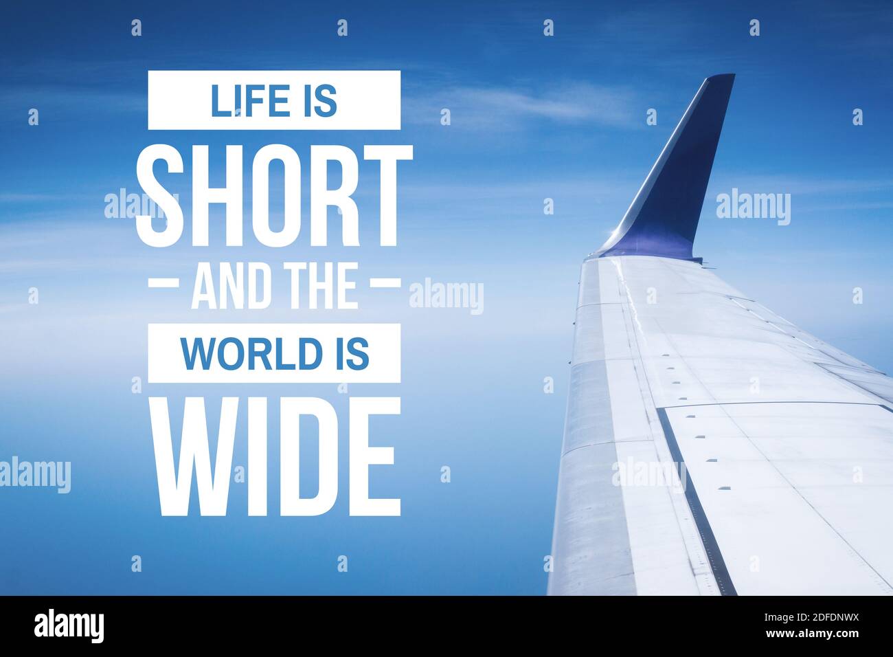 Travel, Adventure and Exploration Quote. Life is Short and The World is Wide. Airplane Wings Against Blue Sky. Stock Photo