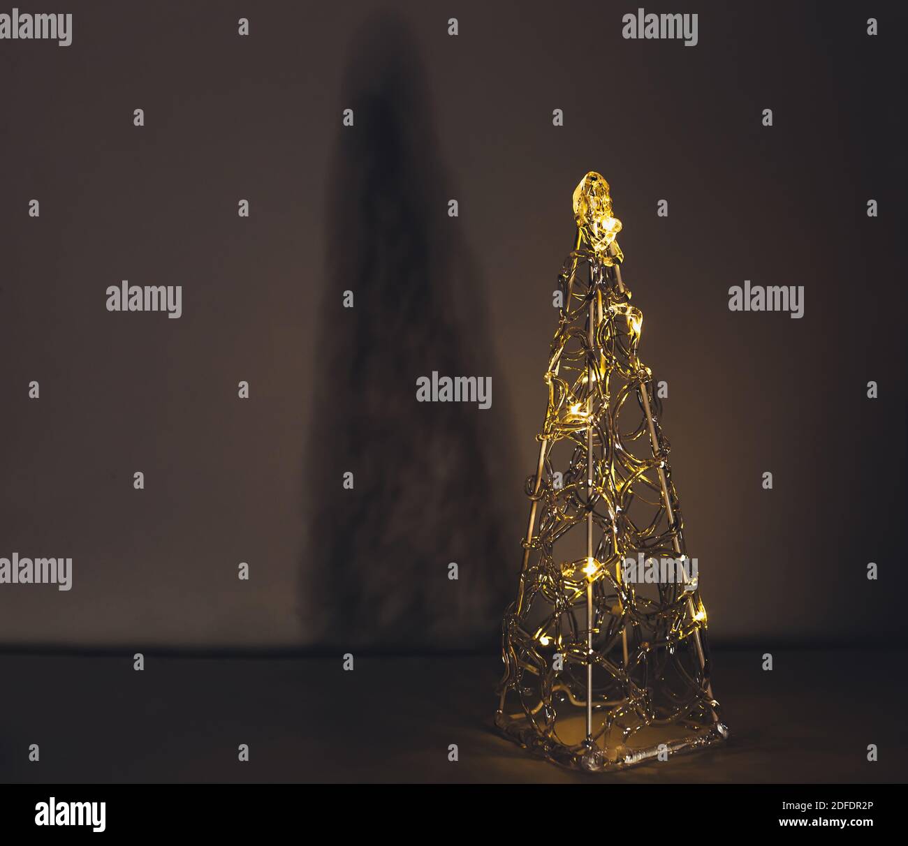 Electric christmas tree from transparent plastic shining in dark Stock Photo Alamy