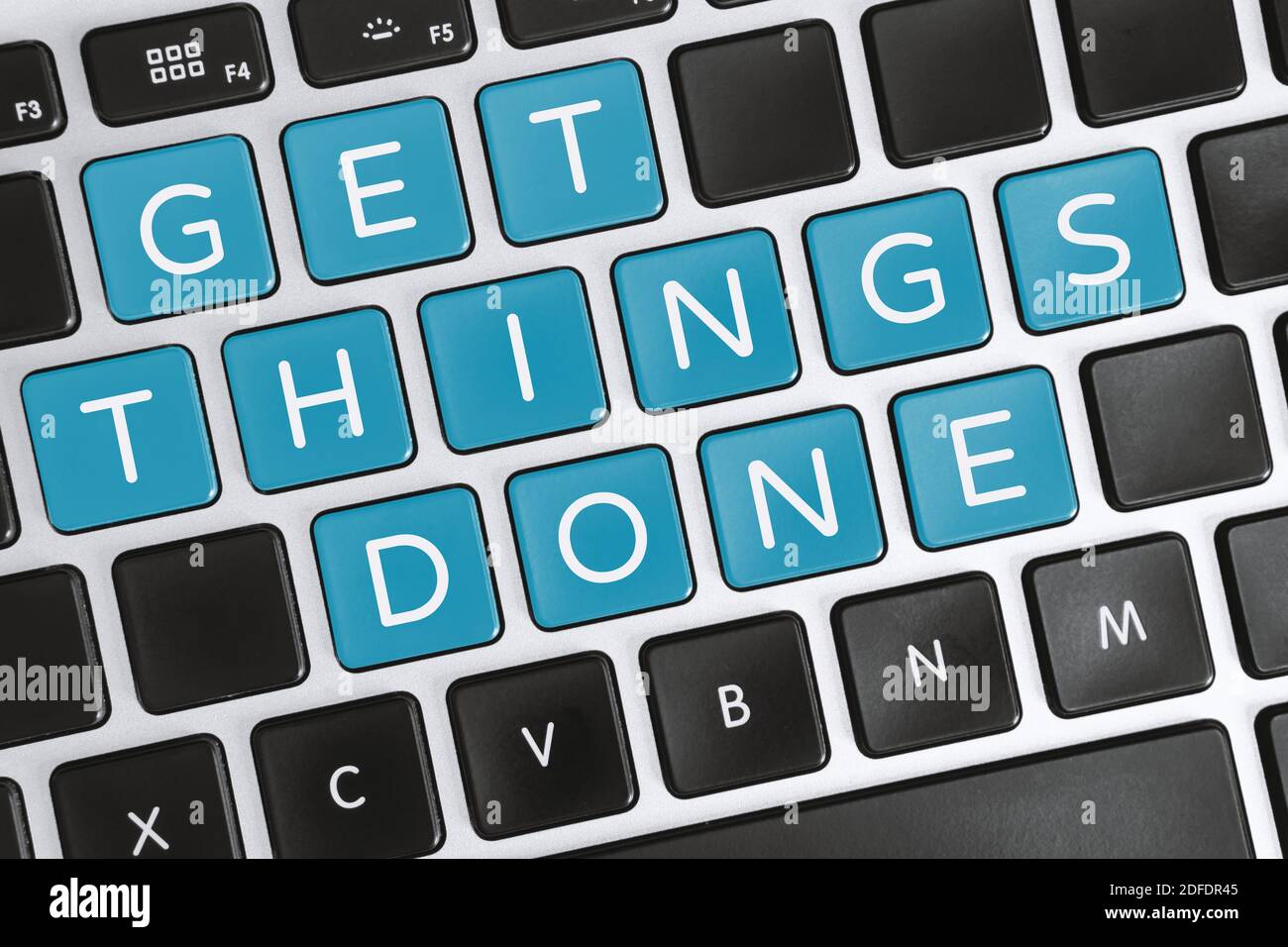 Get Things Done. Inspirational and Motivational Quote on Computer Keyboard. Stock Photo