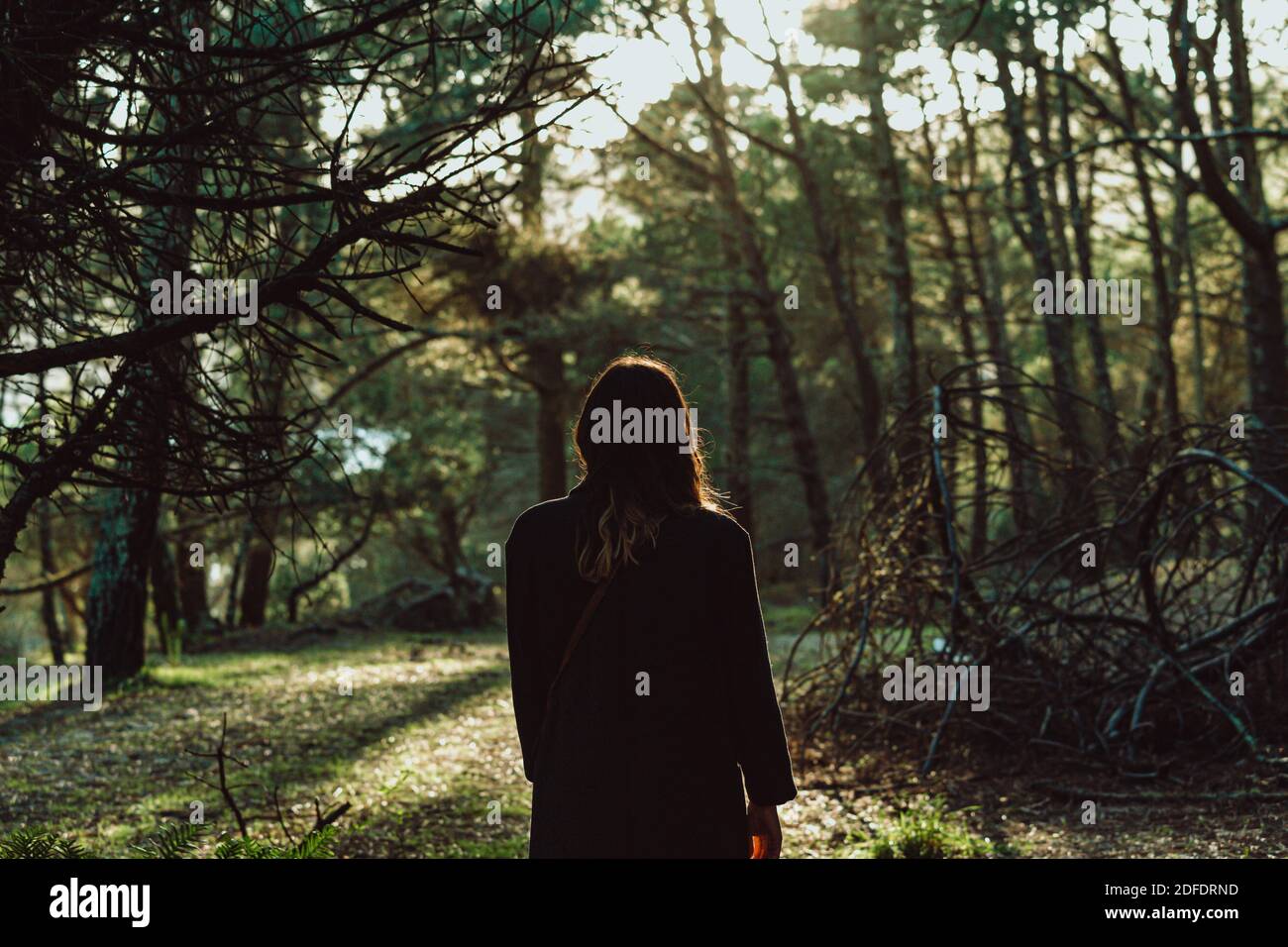 Woman long coat rear view hi-res stock photography and images - Alamy