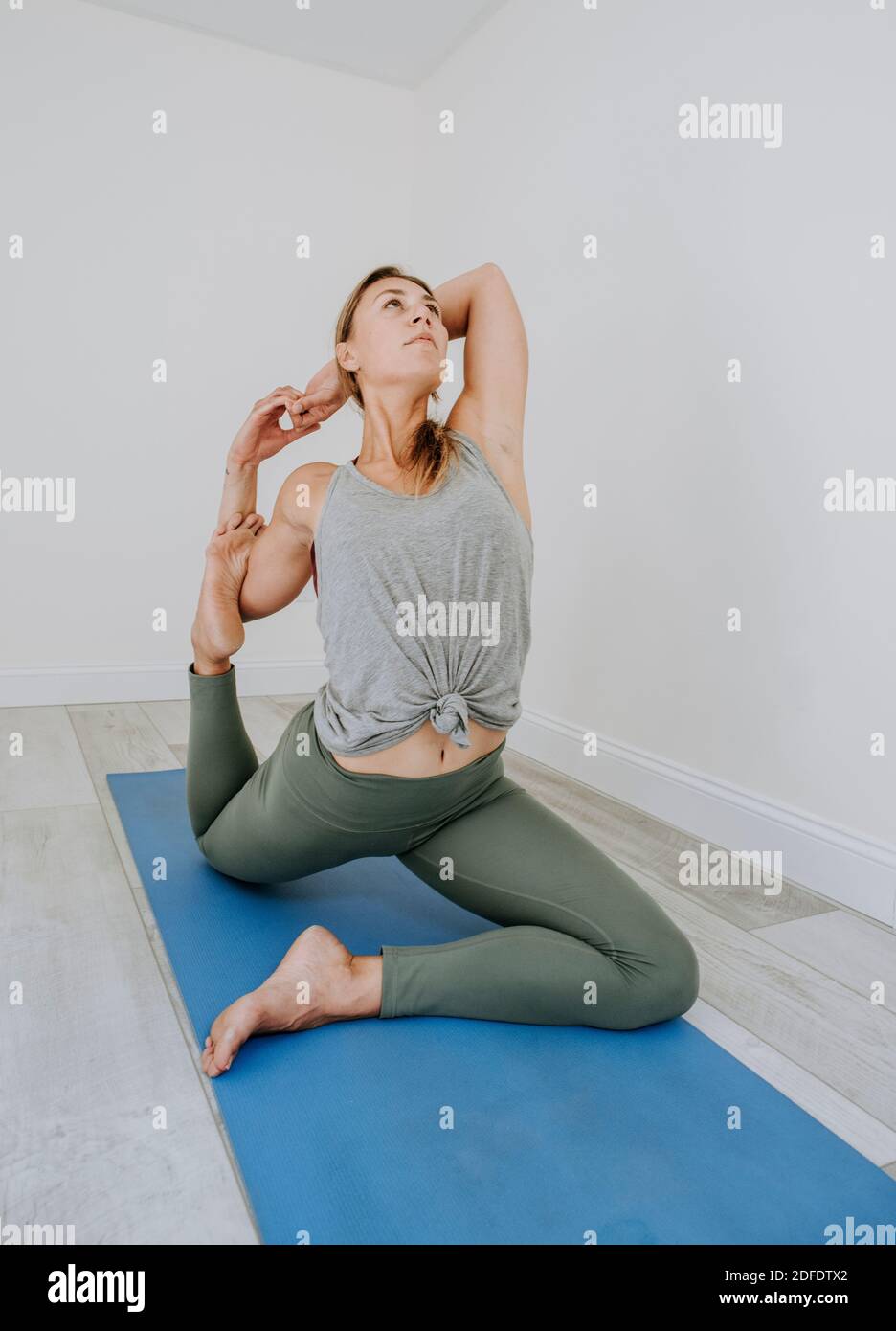 Caucasian woman practices yoga hi-res stock photography and images - Alamy