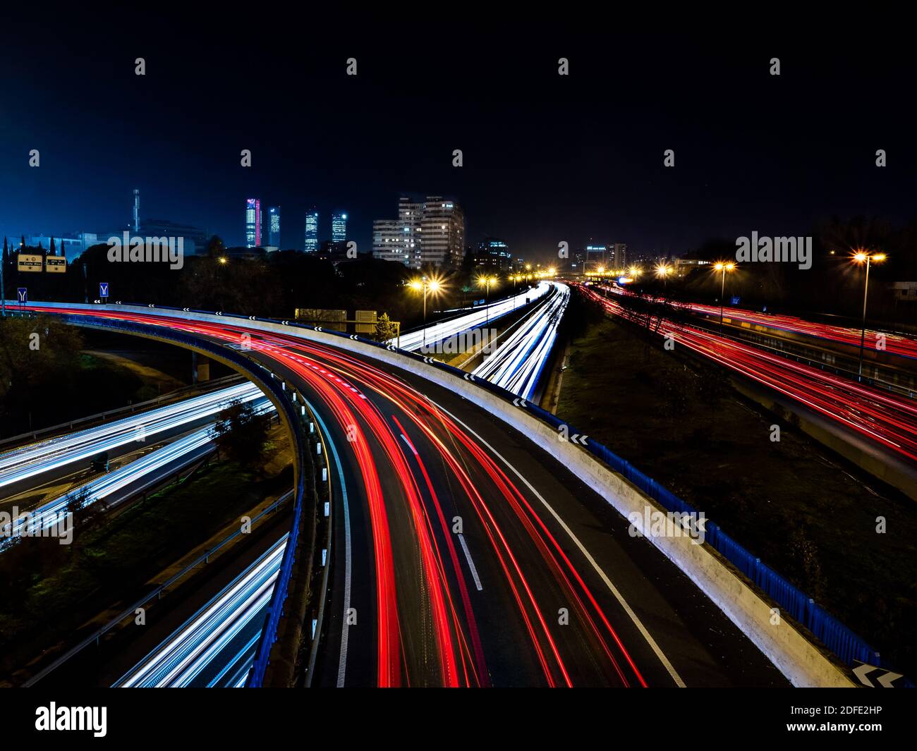 Night landscape of car lights that intersect with long exposure Stock Photo