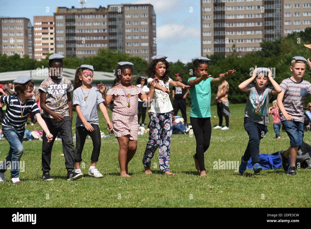 Children playing having fun in the park in Nechells, Birmingham Stock