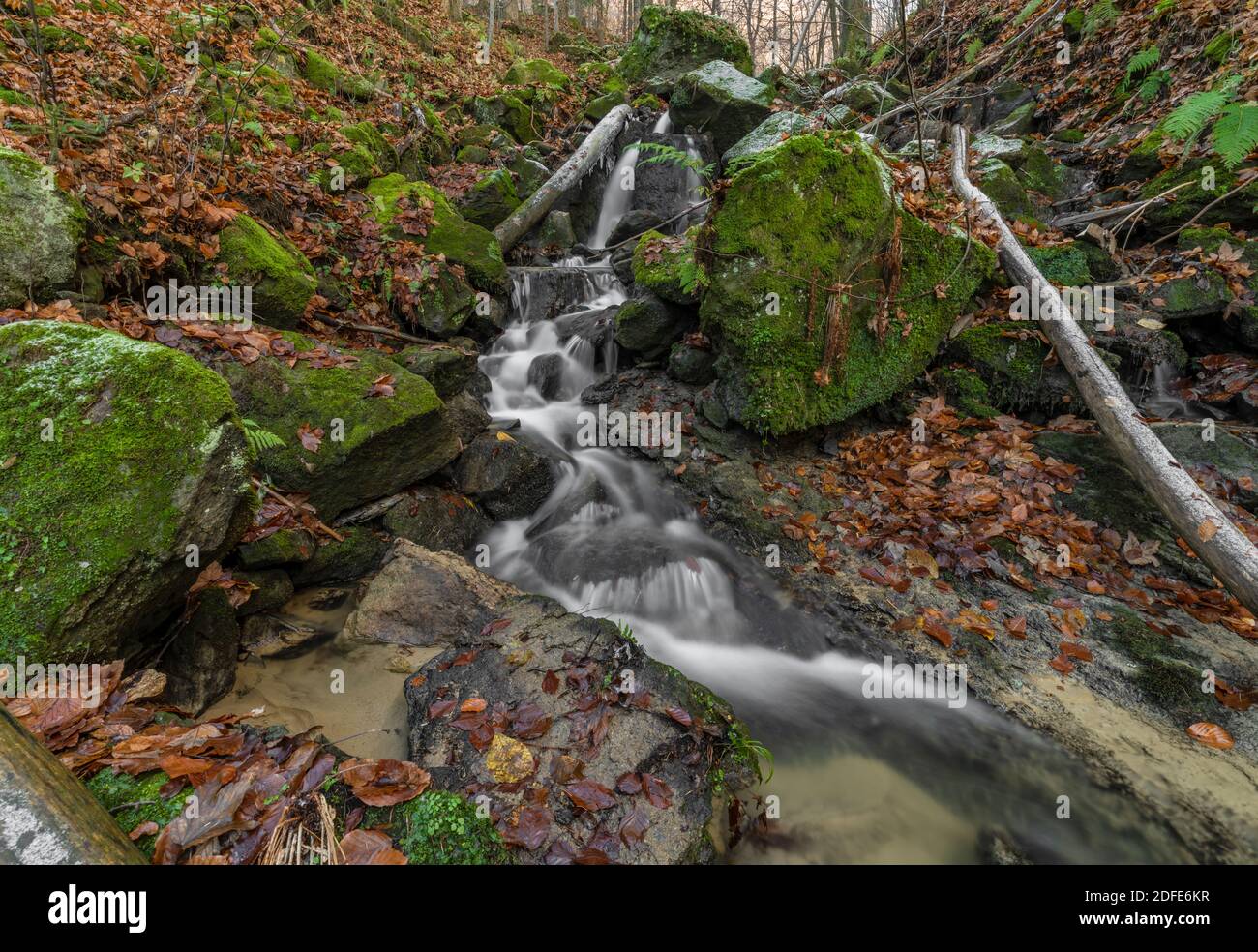 Cascade and creek Bystricka near Bystrice pod Hostynem town in east Moravia in cold autumn day Stock Photo