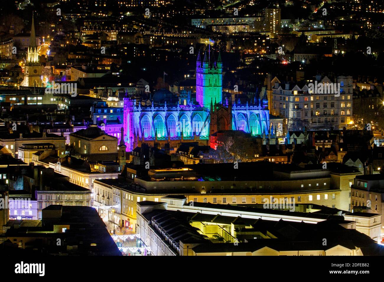 Bath, UK. 4th December, 2020. Bath Abbey is pictured bathed in light on ...
