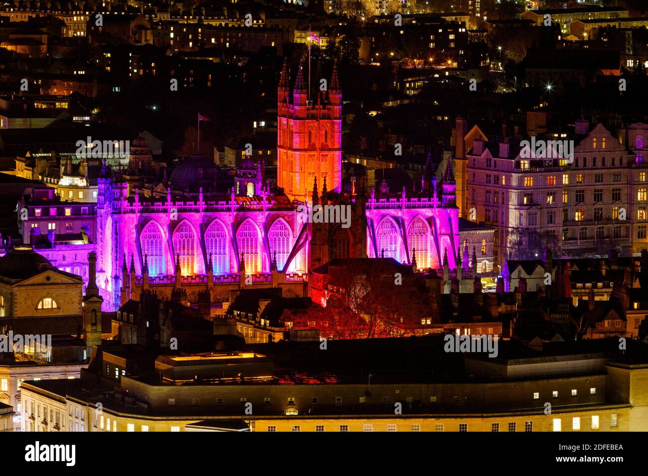 Bath, UK. 4th December, 2020. Bath Abbey is pictured bathed in light on ...