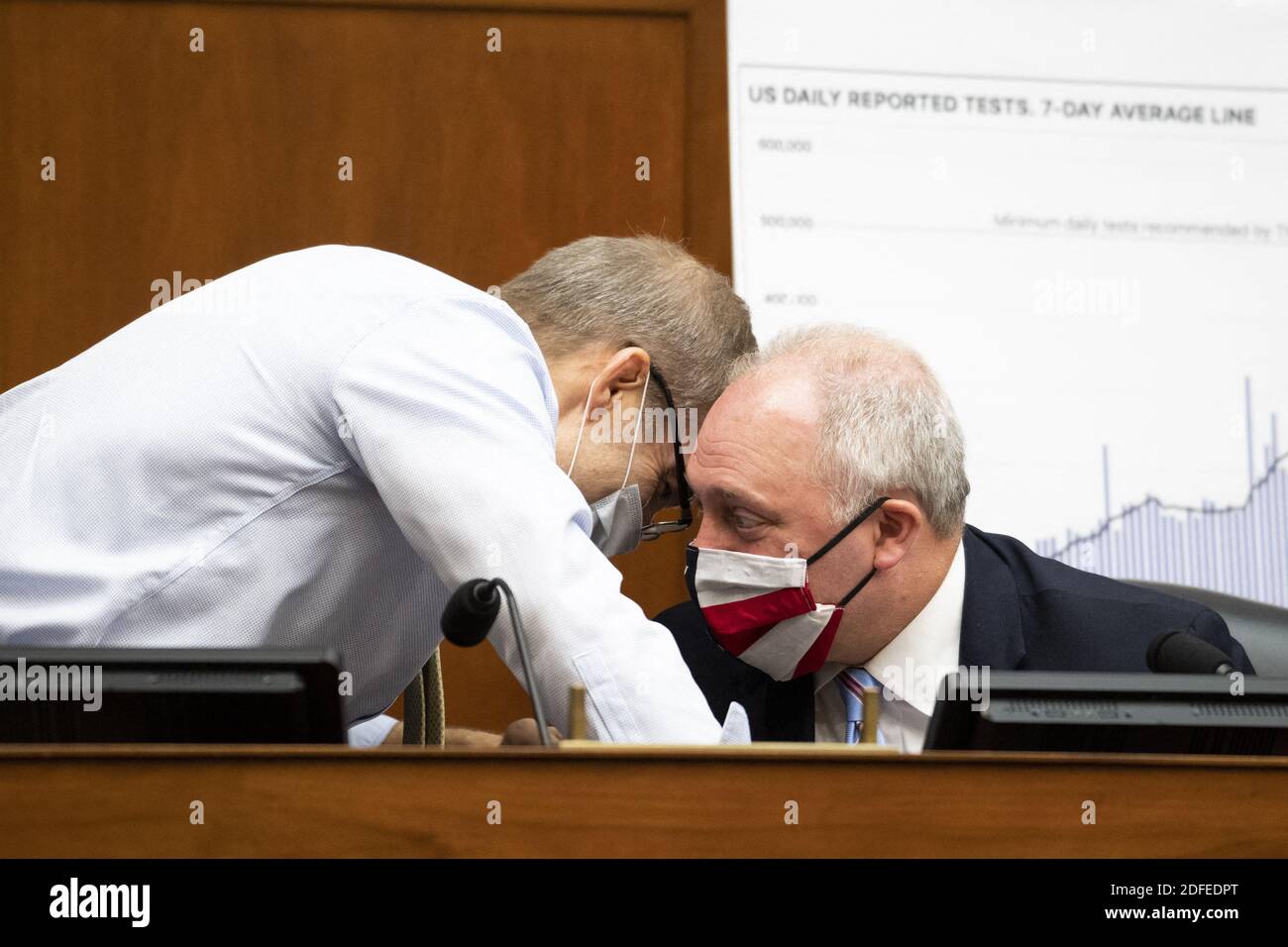 UNITED STATES - JULY 2: Rep. Jim Jordan, R-Ohio, left, and House Minority Whip Steve Scalise, R-La., talk during a House Oversight and Reform Committee hearing on âÂ€ÂœThe Administration's Efforts to Procure, Stockpile, and Distribute Critical SuppliesâÂ€Â in the Capitol in Washington on Thursday, July 2, 2020. Photo by Caroline Brehman/Pool/ABACAPRESS.COM Stock Photo