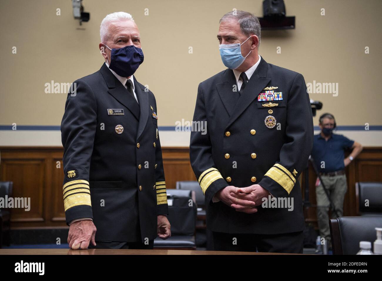 UNITED STATES - JULY 2: Admiral Brett P. Giroir, M.D., Assistant Secretary for Health, left, talks with Rear Adm. John Polowczyk, leader of the Supply Chain Stabilization Task Force and vice director of logistics of the Joint Chiefs of Staff, before the start of a House Oversight and Reform Committee hearing on âÂ€ÂœThe Administration's Efforts to Procure, Stockpile, and Distribute Critical SuppliesâÂ€Â in the Capitol in Washington on Thursday, July 2, 2020. Photo by Caroline Brehman/Pool/ABACAPRESS.COM Stock Photo