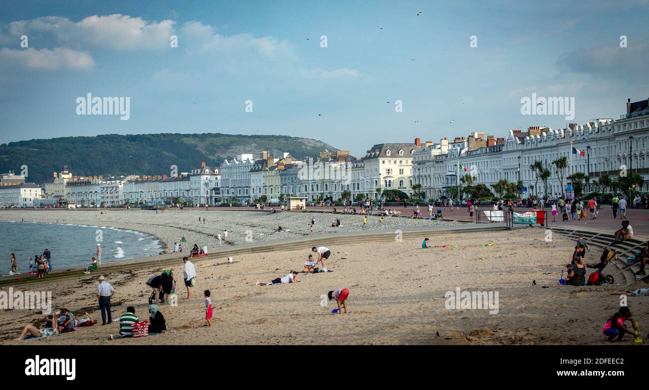 Llandudno Promenade, beach and Victorian hotels as seen late afternoon during August 2020 Stock