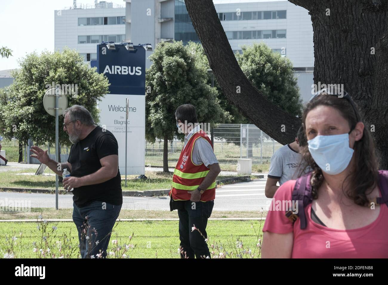 Aibus logo and demonstrators. In Toulouse (France), Airbus employees and its subcontractors demonstrated, on July 9, 2020, at the call of the left wing union CGT. Concerned about plans for layoffs in preparation, they thus intended to protest against the austerity measures of the major aeronautical groups. Political supporters joined the march. Photo by Patrick Batard/ABACAPRESS.COM Stock Photo