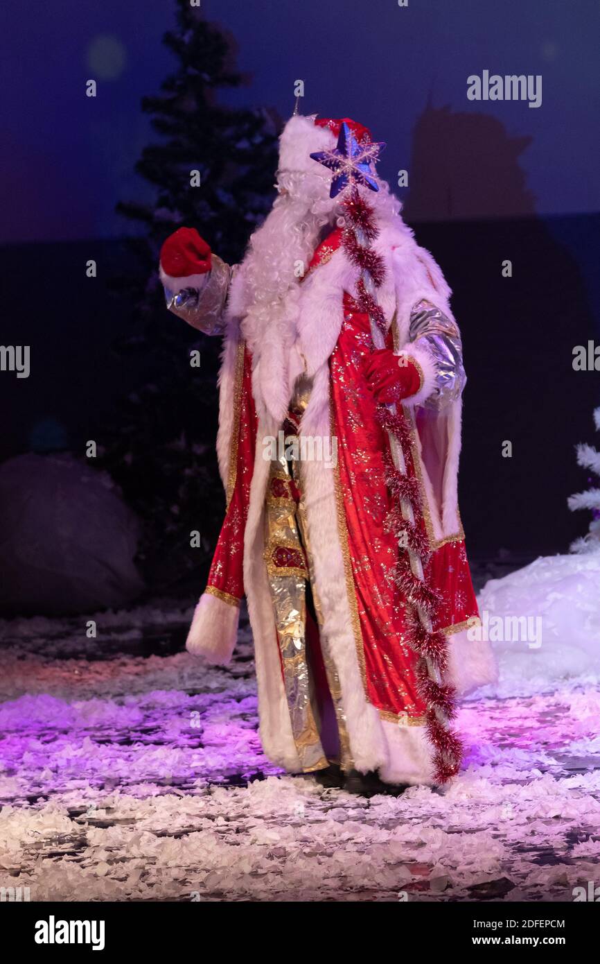 Emotional Santa Claus with a long white beard in a red coat and white ...