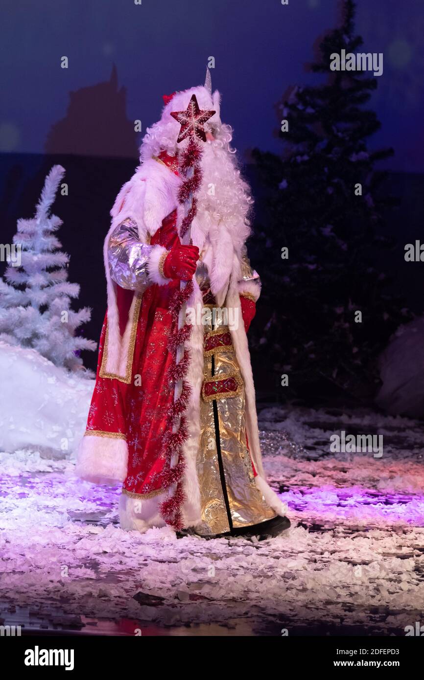 Emotional Santa Claus with a long white beard in a red coat and white ...