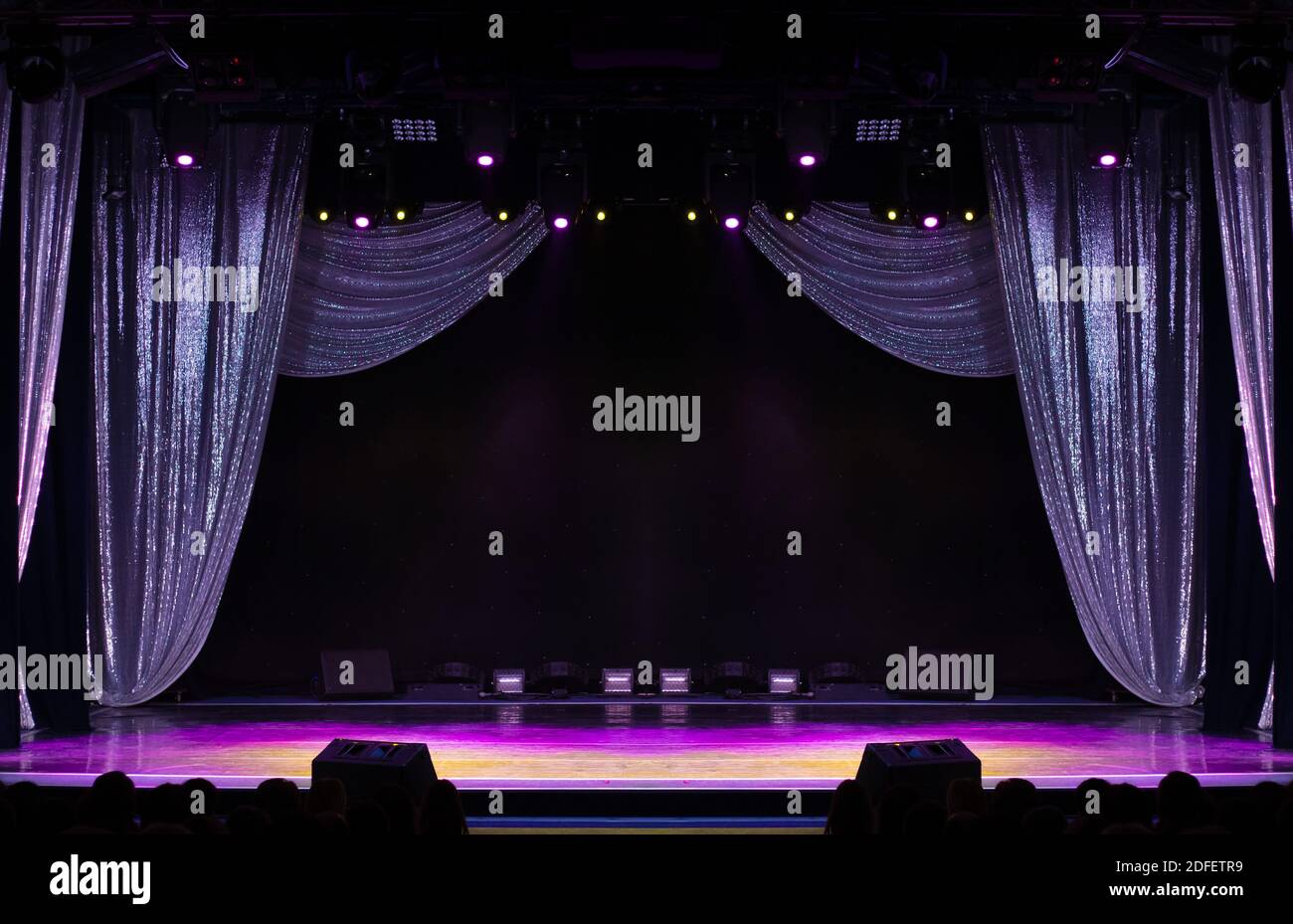 Theater stage and curtain illuminated by stage light and smoke Stock ...