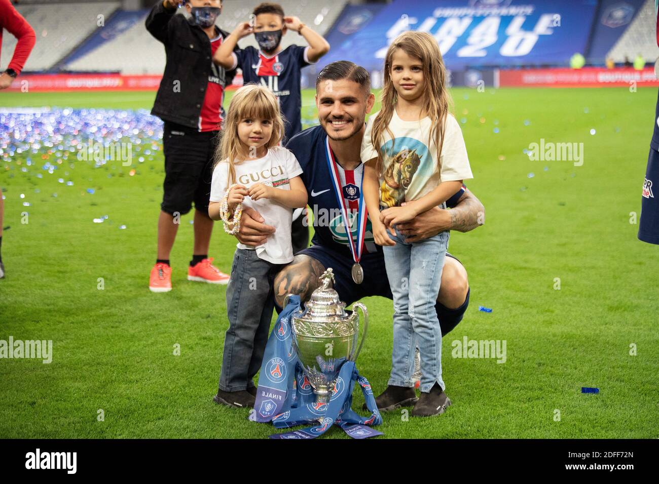 Paris Saint Germain's Mauro Icardi and daughters Isabella and Francesca celebrate with the trophy after winning the French Cup during the Final between AS Saint-Etienne and Paris Saint Germain at Stade de France on July 24, 2020 in Saint-Denis, France. PSG defeated Saint Etienne 1-0 and was crowned French Cup winners. Photo by David Niviere/ABACAPRESS.COM Stock Photo