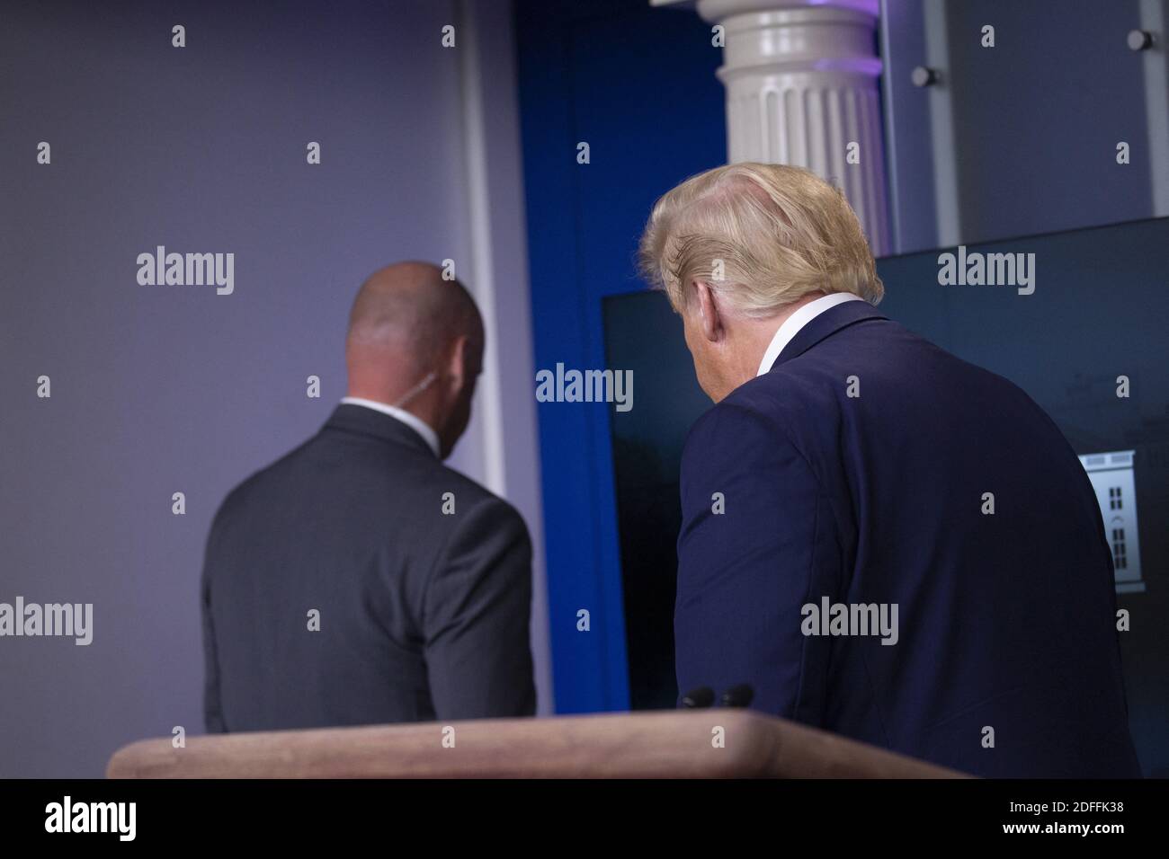 United States President Donald J. Trump is removed from the White House Briefing Room by a US Secret Service agent during a press conference in Washington, DC, USA, on Monday, August 10, 2020. Photo by Stefani Reynolds/Pool via CNP/ABACAPRESS.COM Stock Photo