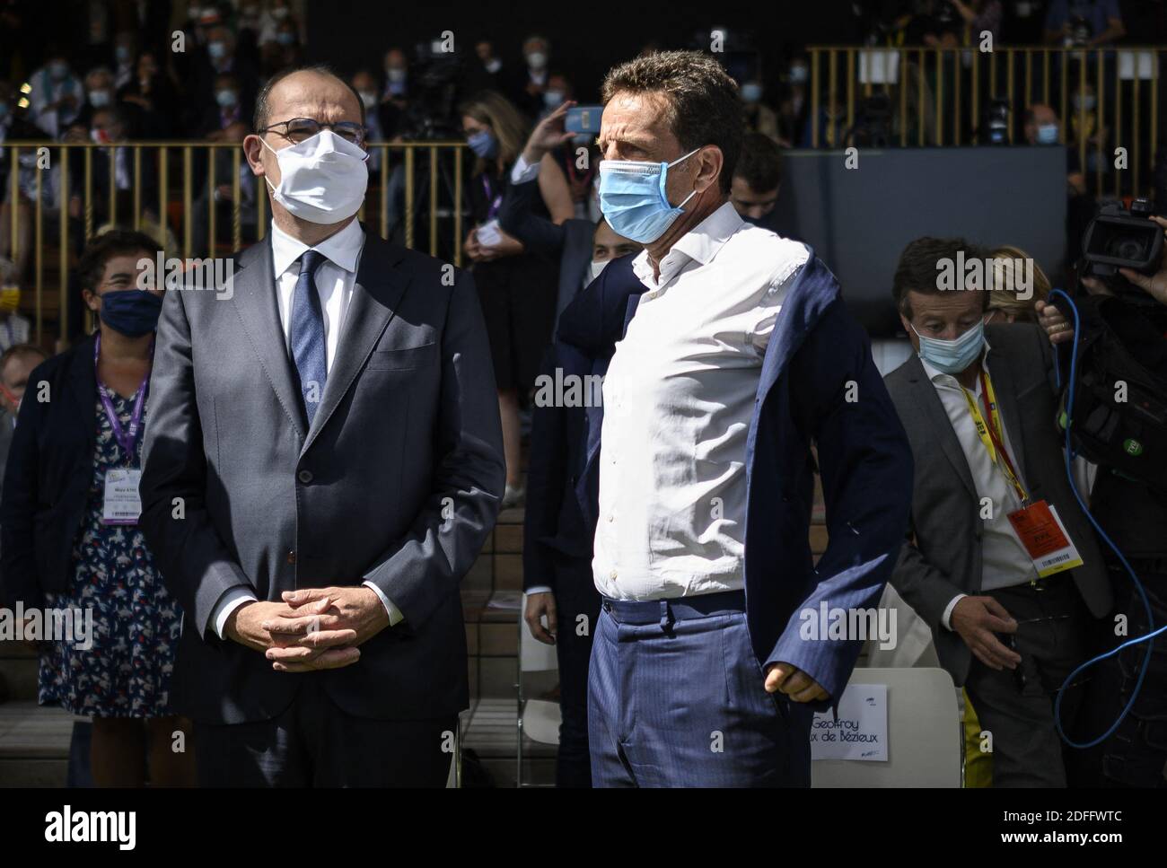 French Employers' association (Medef) President Geoffroy Roux de Bezieux (R) with French Prime Minister Jean Castex, wearing protective face masks, during the summer Medef meeting 'The Renaissance of French Companies' at the Longchamp horse racetrack in Paris on August 26, 2020. Photo by Eliot Blondet/ABACAPRESS.COM Stock Photo