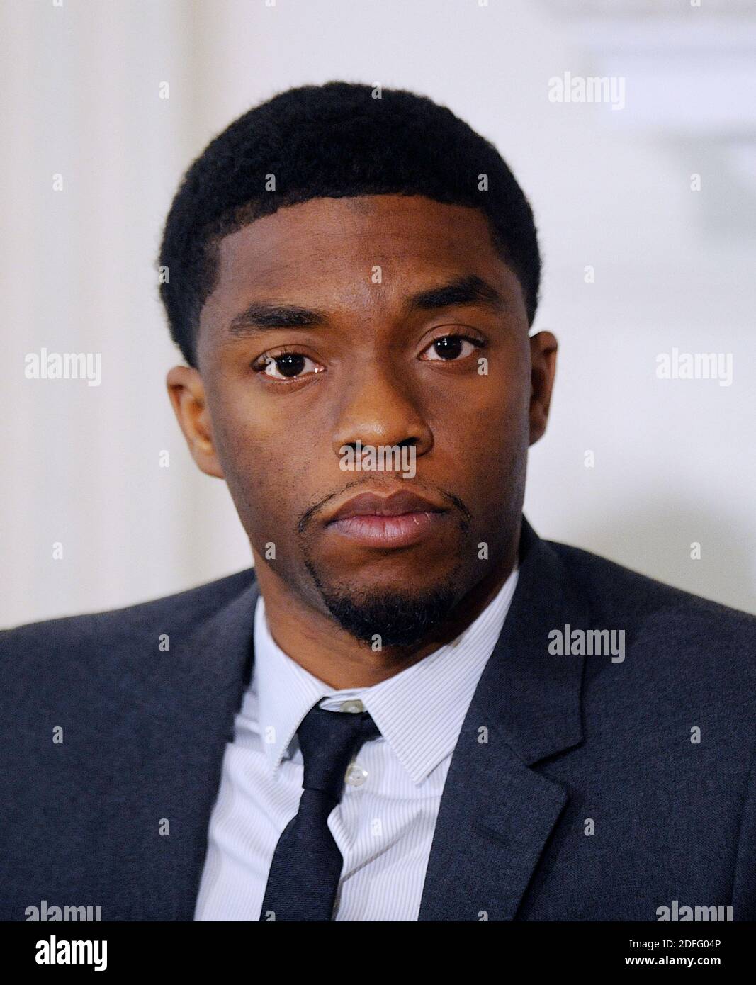 File photo dated April 2, 2013 of Actor Chadwick Boseman listens