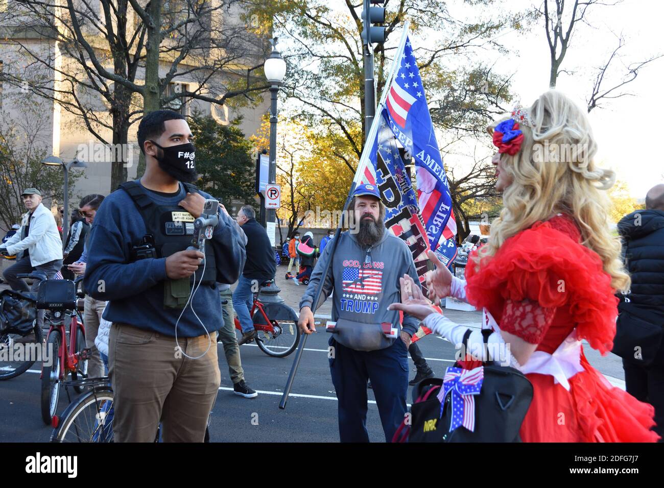 Washington DC. November 14, 2020. Million Maga March. BLM man interviewing a homosexual conservative Trump supporter drag queen Lady Maga. Stock Photo