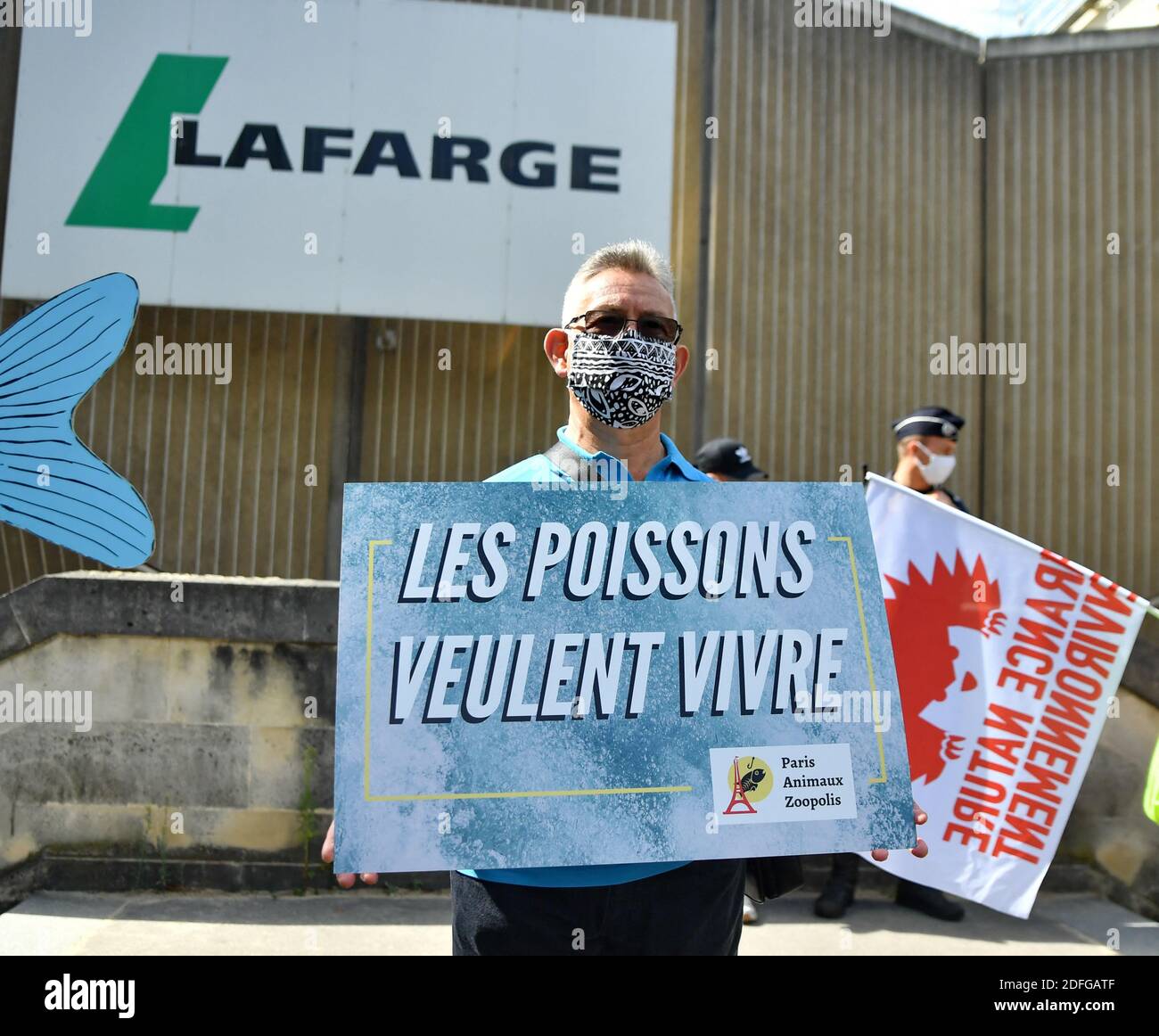 Demonstration in front of the Lafarge cement plant on the Quai de Bercy to  denounce the discharge of pollutants into the Seine. Paris, France on 7  September 2020. The cement manufacturer Lafarge
