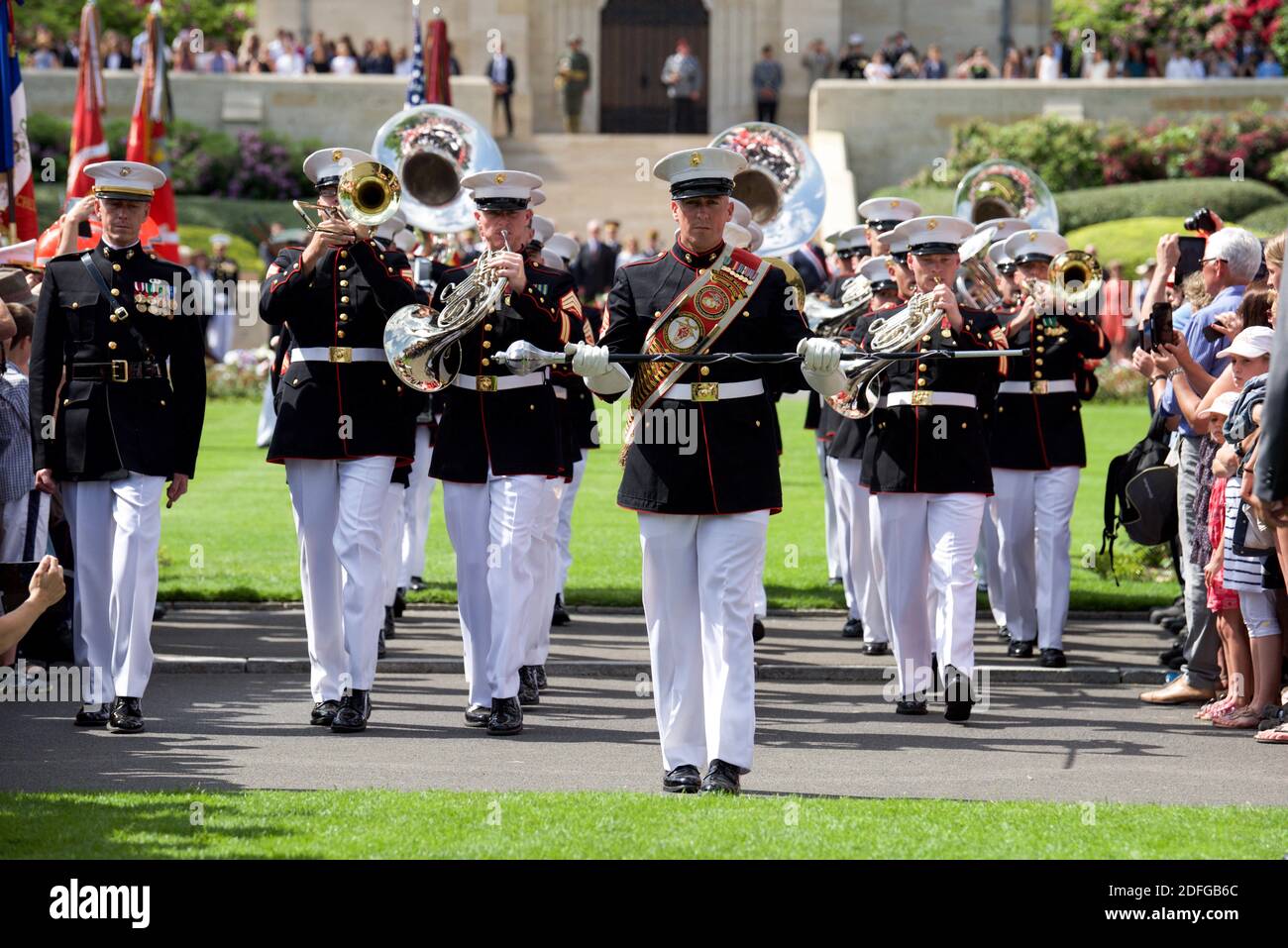 Hand out file photo dated May 27, 2018 of Marines with the 2nd Marine Division Band march off after the ceremony of The Battle of Belleau Wood Centennial at the Aisne-Marne American Cemetery, France. The Ceremony commemorated the sacrifices made during WWI. President Trump reportedly skipped his scheduled visit to the Aisne-Marne American Cemetery near Paris in 2018 after dismissing the U.S. soldiers who died during the Battle of Belleau Wood as “losers.” According to a report in The Atlantic published Thursday, Trump’s excuses of “the helicopter couldn’t fly” and that the Secret Service would Stock Photo