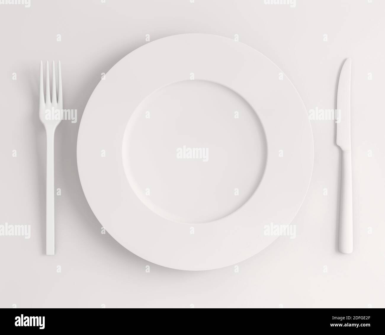 a top view white plate fork and knife on a white background Stock Photo ...