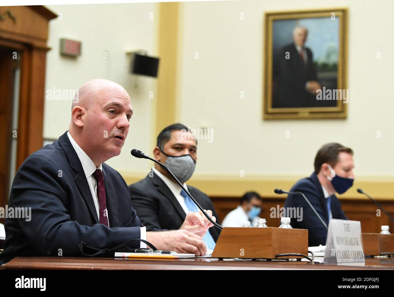 R. Clarke Cooper (L), Assistant Secretary of State for Political-Military Affairs, Brian Bulatao (C), Under Secretary of State for Management, and Marik String, Acting Legal Adviser for the State Department, testify before a House Committee on Foreign Affairs hearing looking into the firing of State Department Inspector General Steven Linick, on Capitol Hill in Washington, D.C. on Wednesday, September 16, 2020. Photo by Kevin Dietsch/Pool/ABACAPRESS.COM Stock Photo