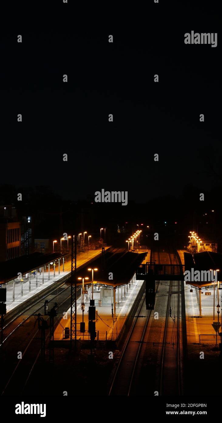 Very quiet railway station of Mainz in the night during the corona pandemic Stock Photo