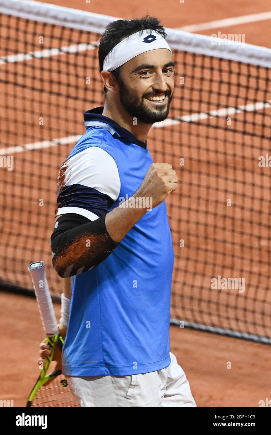 Lorenzo Giustino of Italy wins his men's singles first round match against  Corentin Moutet of France on day two of the 2020 French Open at Roland  Garros on September 28, 2020 in