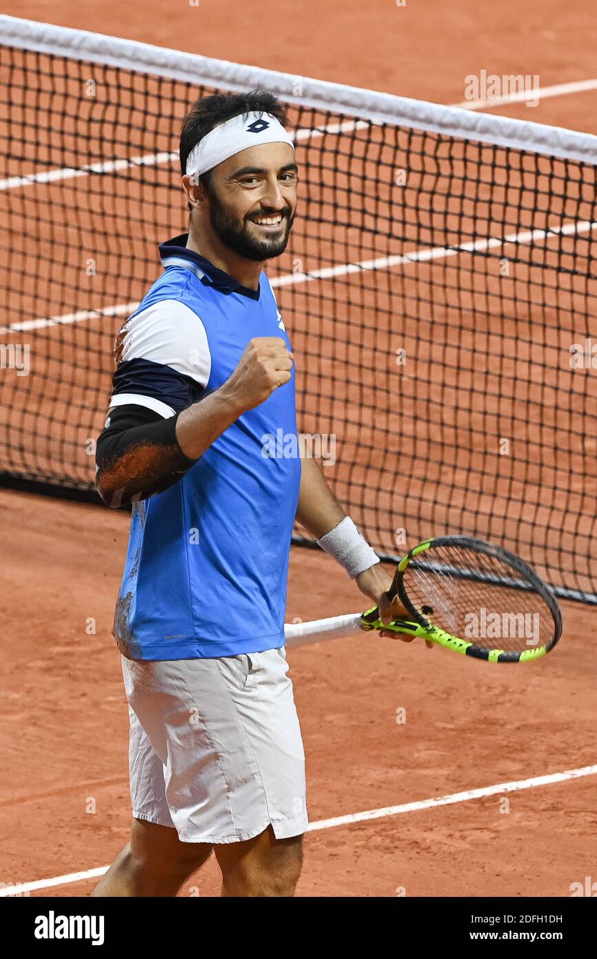 Lorenzo Giustino of Italy wins his men's singles first round match against  Corentin Moutet of France on day two of the 2020 French Open at Roland  Garros on September 28, 2020 in