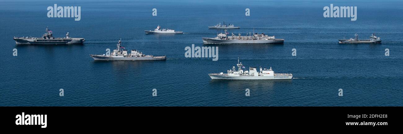 Handout file photo dated June 8, 2020 of Ships from nations participating in exercise Baltic Operations (BALTOPS) 2020 sail in formation while in the Baltic Sea. The ships pictured are (in alphabetical order by home nation): the Royal Canadian Navy Halifax-class frigate HMCS Fredericton (FFH 337), the German navy Bremen-class frigate FGS Luebeck (F214), the German navy Rhoen-Class replenishment oiler FGS Rhoen (A1443), the Royal Norwegian Navy Fridtjof Nansen-class frigate HNoMS Otto Suerdrup (F312), the U.S. Navy Blue Ridge-class command and control ship USS Mount Whitney (LCC 20), the U.S. N Stock Photo