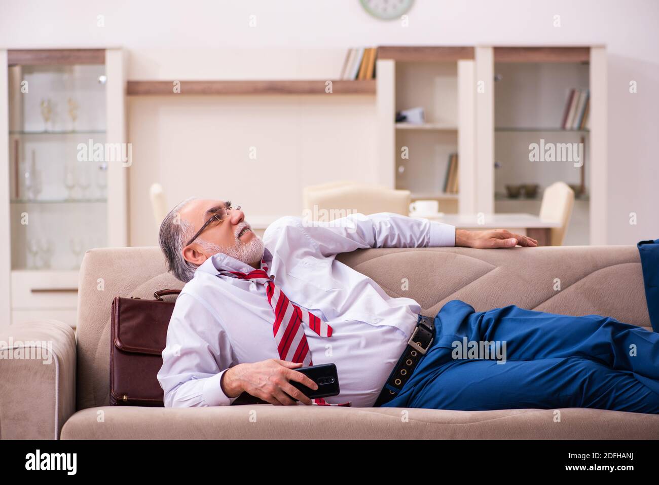 Senior old man coming work hi-res stock photography and images - Alamy