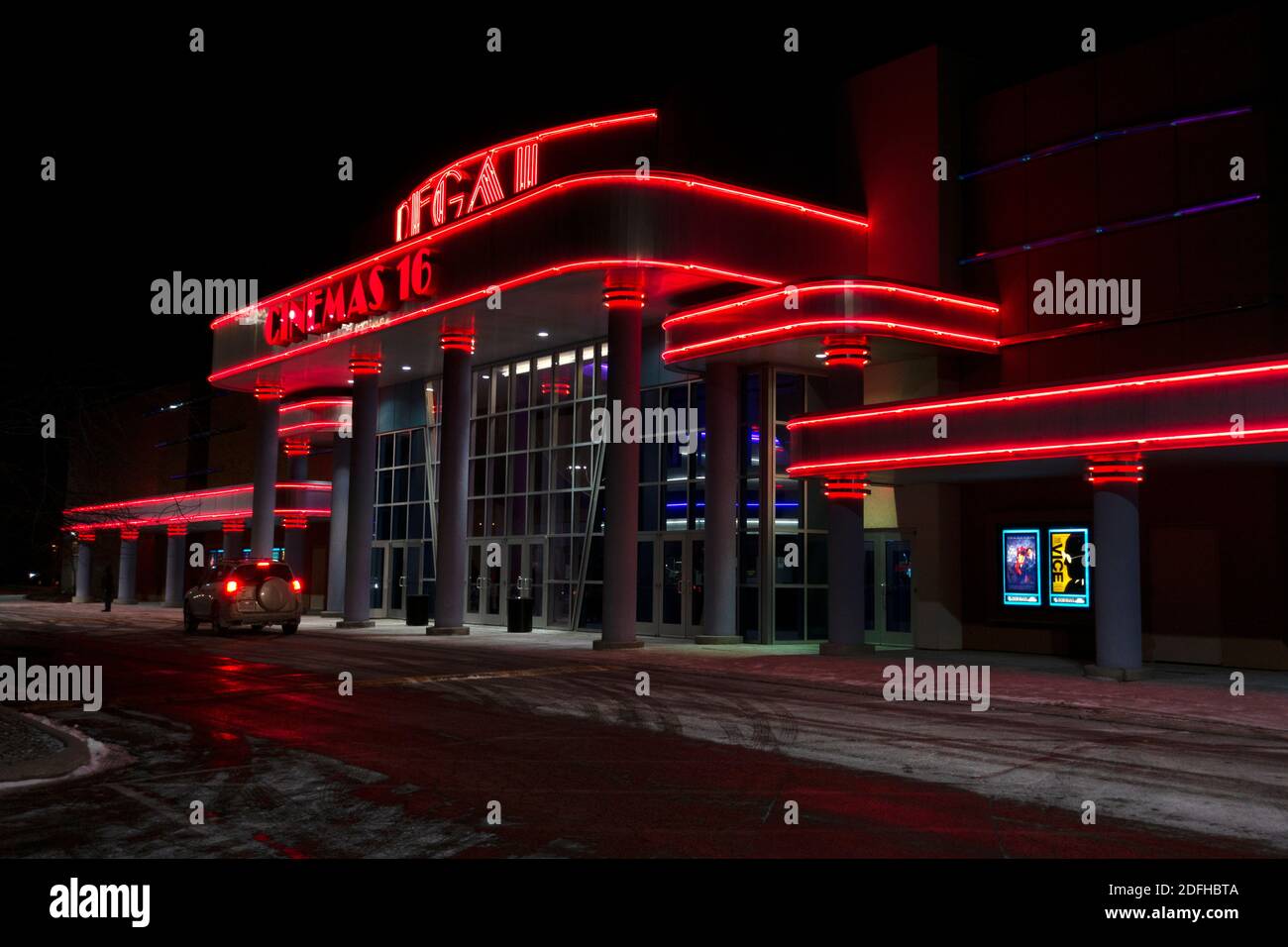 Outside movie theater night sign lights modern hires stock photography