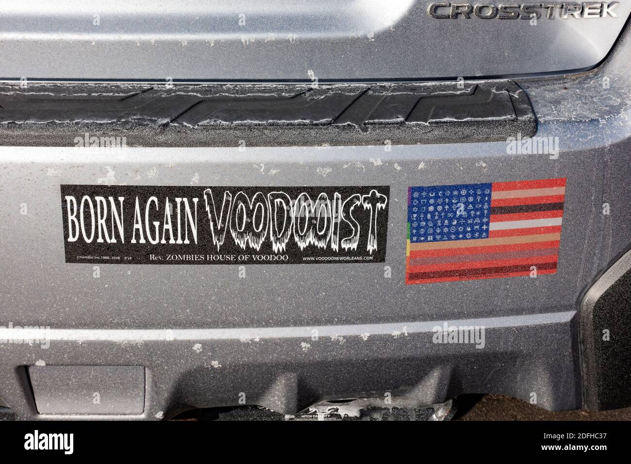 Bumper stickers "Born Again Voodooist" and American Flag representing various religious symbols. St Paul Minnesota MN USA Stock Photo