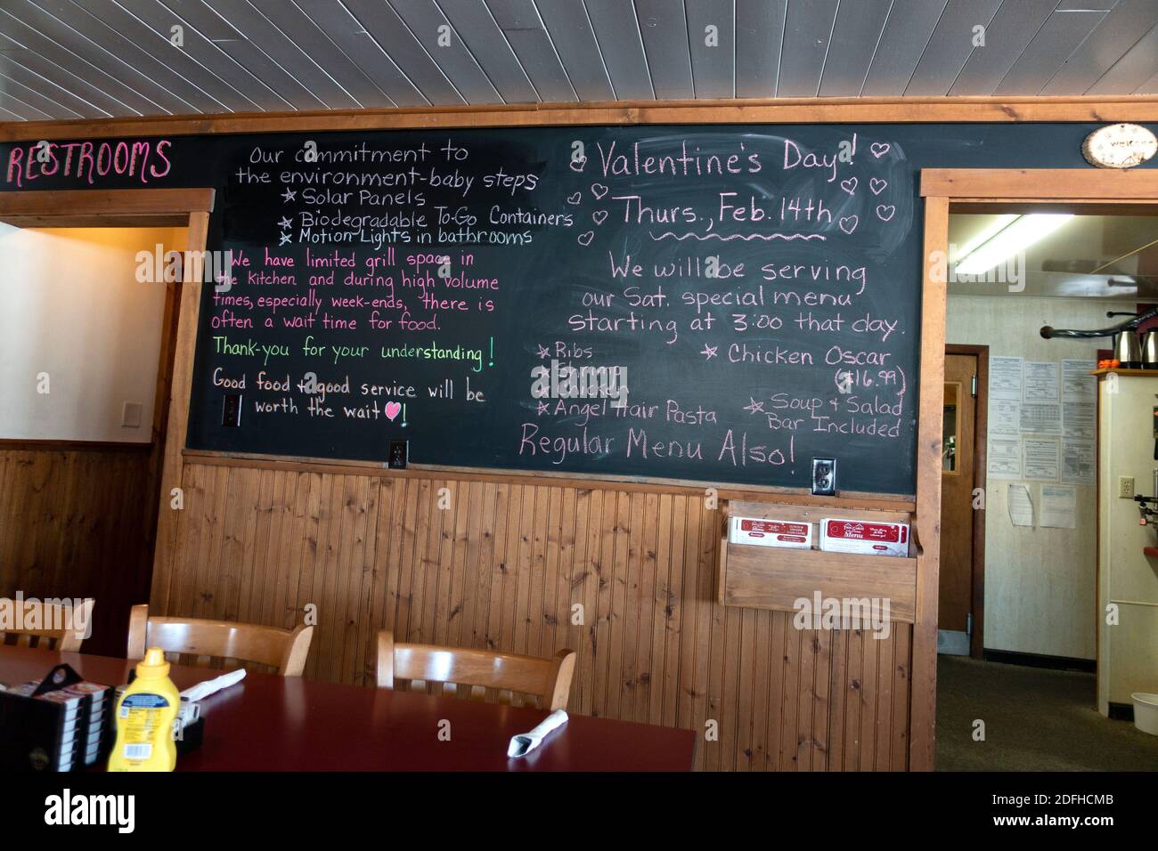 Twin Gables Cafe menu written on chalk blackboard offering a Valentine's day special. Brule Wisconsin WI USA Stock Photo