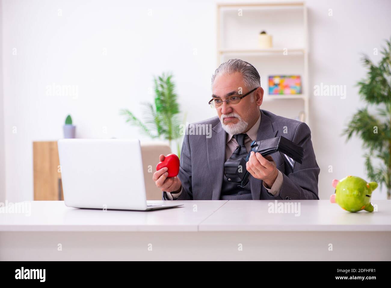 Old man in romantic concept Stock Photo - Alamy