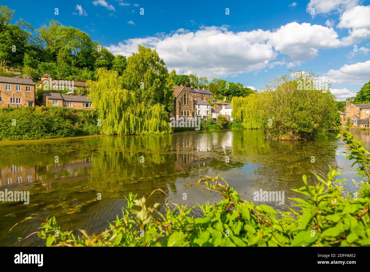 View of reflections in Cromford pond, Cromford, Derbyshire Dales, Derbyshire, England, United Kingdom, Europe Stock Photo